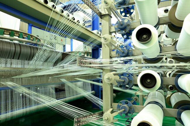 fabric being strung out